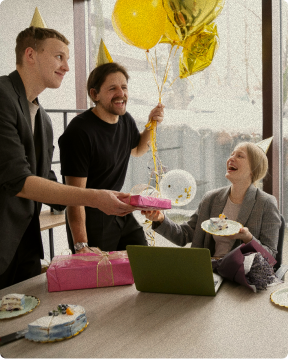 Team celebration with cake